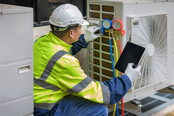 Professional Air Conditioning Repair technician working in Wapella, IL